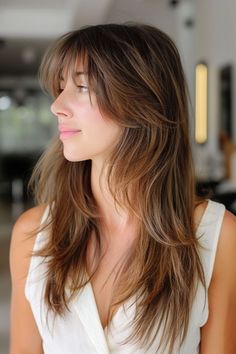 Woman with long hair and stylish bangs. Hair Inspiration, Long Hair Styles, Hair Styles