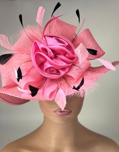 This hat is a very elegant and sophisticated coral colored straw hat. A beautiful design featuring a large flower made from loops, swirls and leaves sits on the brim of the hat. Perfect hat for Easter ,church or for the Kentucky Derby. Stunning for a wedding party or tea party.  The hat  also has a Downton Abby feel to it . Beautiful for a tea party, wedding party, gala, or any other special occasion hat. You will love it! Brim: 4" Rise: 4" Size: Internal Draw String to adjust to any size head Rose-colored Fascinator For Party, Elegant Rose Party Hat, Elegant Rose Hat For Kentucky Derby, Elegant Rose Fascinator For Kentucky Derby, Fitted Pink Hat With Curved Brim, Fitted Short Brim Pink Hat, Fitted Pink Hat With Short Brim, Pink Fitted Hat With Short Brim, Pink Brimmed Costume Hats For Party