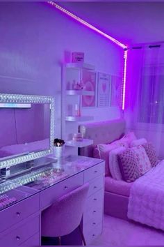 a bedroom with purple lighting and pink furniture