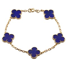 This rare Van Cleef & Arpels bracelet from the classic Vintage Alhambra collection is crafted in 18k yellow gold and features 5 lucky clover motifs inlaid with blue lapiz lazuli in round bead settings. Made in France circa 1980s. Measurements: 0.59" (15mm) width, 7.5" (19.5cm) length. Excellent condition. Comes with original pouch and VCA service receipt. Van Cleef Navy Blue, Blue Van Cleef Bracelet, Blue Van Cleef, Van Cleef Jewelry, Van Cleef Arpels Bracelet, Van Cleef Bracelet, Braclets Gold, Navy Blue Vans, Van Cleef Necklace