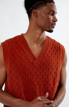 Accent your summer style with the PacSun Sweater Vest, a versatile staple for any wardrobe. Featuring a classic v-neckline and sleeveless design, it offers a lightweight feel with its woven knit fabrication and soft cotton blend. Perfect for layering or wearing solo, it adds a touch of sophistication to any warm-weather ensemble.


	V-neckline
	Sleeveless
	Standard fit
	Woven knit
	100% Cotton
	Machine washable
	Model is wearing size medium
	Model Measurements: 6'1” Height, 31” Waist, 32” Inseam Orange Sweater Vest, Pacsun Sweater, Pacsun Sweaters, Sweater Vest Outfit, Burnt Orange Sweater, Pacsun Mens, Sweater Vest Mens, Orange Sweater, Orange Sweaters