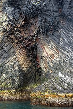 an artistic rock formation in the water