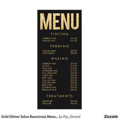 a menu for a restaurant with gold foil lettering on black paper, and an image of a