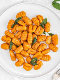 a white plate topped with sweet potato shells