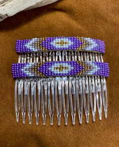 Native inspired/designed hair combs are lovingly handcrafted. They are loom beaded with glass seed beads (three shades of purple, white and silver lined gold).  They are 3" long. These are sold as a pair, not individually.

I also do custom orders / colors. These will have at least 2 days and up to a week added to the shipping time, depending on how many are needed. Native Beading, Hair Slides, Beaded Earrings Diy, Native Beadwork, My Community, Native Design, Work Hairstyles, Earrings Diy, Hair Slide