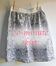 a skirt hanging on a clothes line with the words 20 minute skirt