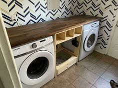 a washer and dryer in a small room