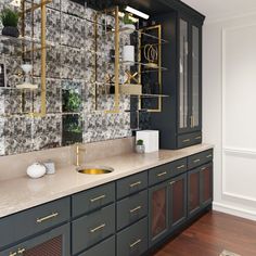 a kitchen with marble counter tops and gold accents on the cabinets, along with an open shelving unit