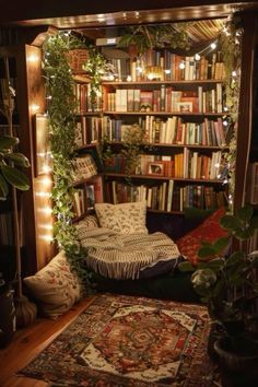 a living room filled with lots of books and plants on top of a book shelf