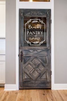 an old door with a sign on it that says patty room in front of the door