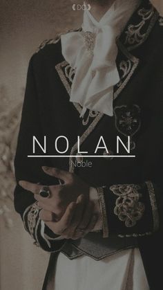 a man in a black jacket and white shirt with the words nolan on it