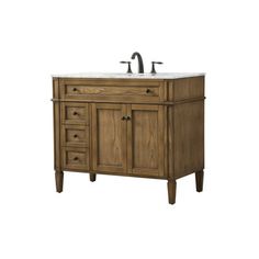 a bathroom vanity with two faucets on the top and one sink below it