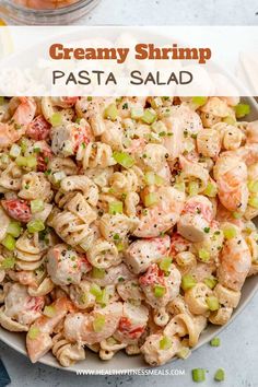 creamy shrimp pasta salad in a white bowl