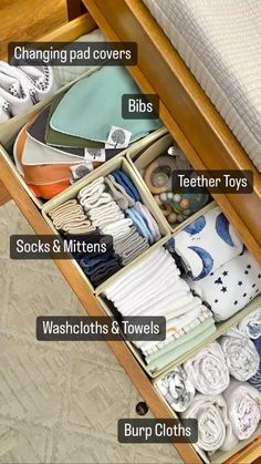 an open drawer with lots of items labeled in the bottom and bottom drawers on each side