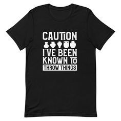 Pottery Gift, Pottery Artist Shirt, Ceramic Artist Gift, Potter Shirt, Pottery Lover Shirt You Will Love this Unique and Funny "Caution I've Been Known to Throw Things" T-shirt. Makes A Great Gift For Friends and Family! Please refer to the listing pictures for the size guide and other color options. * Bella-Canvas Short Sleeve Unisex T-Shirt * Design is printed on One side * 100% combed and ring-spun cotton (Heather colors contain polyester) * Fabric weight: 4.2 oz./yd.² (142 g/m²) * Pre-shrunk fabric * Side-seamed construction * Shoulder-to-shoulder taping * Design is professionally PRINTED using commercial grade equipment for a long lasting shirt. * Soft and High-Quality Fabric ►► FONTS & DESIGN * Design size and placement is approximate. Each shirt is custom hand made. Exact size & pla Pottery Artist, Artist Shirts, Pottery Gifts, Artist Gifts, Ceramic Artists, Design Design, Fonts Design, Have A Great Day, T Shirt Design