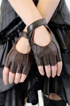 These fingerless, leather gloves from Steam Trunk are modeled after classic riding gloves. They are made from 100% leather and... Fantasy Fingerless Gloves, Fantasy Gloves, Steam Trunk, Steampunk Gloves, Fingerless Leather Gloves, Gloves Diy, Leather Fingerless Gloves, Leather Driving Gloves, Gloves Fingerless