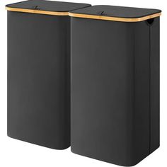 two black trash cans with gold trims on the top and bottom, side by side