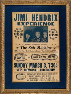 an old concert poster with the band's name and dates in gold framed frame