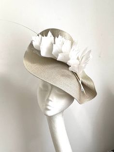 Beige Feather Hat This lovely beige Hat is made inspired by coming races. A beige Hat will be an amazing accessory to compliment your outfit. It's elegant and simple. The beige hat will fit the average head size. Its made from a fabric-covered headband attached to the saucer base on which sits white and Ivory color feathers. To secure your fascinator there is a comb inside the hat attached to the headband, so the fascinator sits very securely on your head. Enjoy your special day with this beauti Luxury Fitted Beige Fascinator, Cream Fascinator For Spring Garden Party, Spring Cream Fascinator For Garden Party, Spring Garden Party Cream Fascinator, Cream Headpiece For Spring Garden Party, Cream Adjustable Fascinator For Spring, Beige Summer Fascinator For Garden Party, Beige Headpieces For Spring Garden Party, Spring Cream Adjustable Fascinator