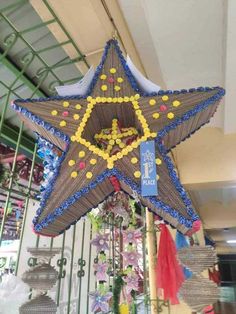 a large star decoration hanging from the ceiling