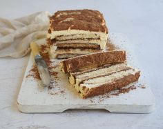 slices of cake sitting on top of a cutting board