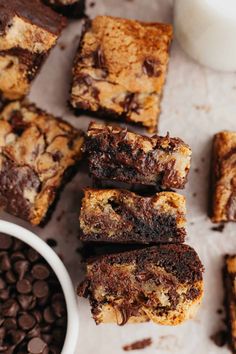 chocolate chip brownies and milk on a table