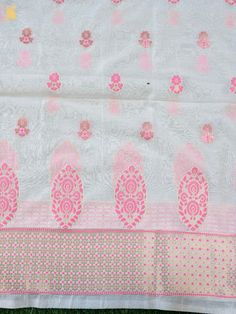 This intricately designed Cotton Silk three-piece suit ensemble from Khinkhwab features a kurta fabric and dupatta. It's a must-have for this festive season, offering a perfect blend of traditional elegance and modern style. Festive White Cotton Silk Churidar, White Cotton Silk Churidar With Pallu, Traditional Pink Anarkali Set In Cotton Silk, Designer Semi-stitched Kurta With Zari Weaving, Designer Chanderi Salwar Kameez With Pallu, Traditional Churidar With Cutdana For Designer Wear, Designer Banarasi Silk Churidar With Pallu, Pink Cotton Silk Unstitched Suit In Traditional Drape, Pink Cotton Silk Unstitched Suit With Traditional Drape