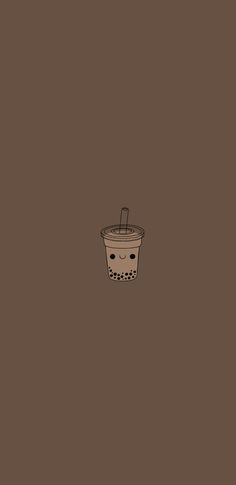 a coffee cup with a straw sticking out of it's side on a brown background