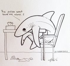 a drawing of a dolphin sitting at a table