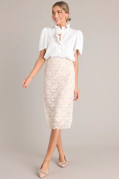 Unleash your delicate side with our Delicate Touch Beige Lace Midi Skirt! This skirt features intricate lace detailing, adding a touch of elegance to any outfit. With a midi length, it offers versatility for different occasions. Perfect for the fashion-forward who want to make a statement without sacrificing comfort. This beige midi skirt features a high waisted design, an elastic waistband, and a delicate lace overlay. Summer Party Skirt With Lace Top, Cream Lace Skirt Outfit, Chic Party Skirt With Lace Trim, Elegant Lace Patchwork Skirt, Elegant Skirt With Lace Patchwork, Spring Party Skirt With Lace Trim, Spring Wedding Skirt With Lace Patchwork, Elegant Maxi Skirt With Lace Trim, Elegant Fitted Skirt With Lace Patchwork