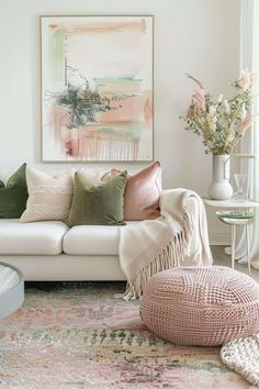 a living room with white couches and colorful pillows on top of the rugs