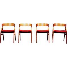 three wooden chairs sitting next to each other