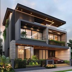 this is an image of a modern style house in the evening time with cars parked on the driveway