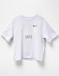 Nike Sportswear Classic Boxy Tee. 1972, The Year We Launched The First Nike Shoe, Serves As A Reminder Of The Past As You Reach Towards The Future. Heavyweight Cotton Gives You A Structured And Premium Feel, While The Boxy Fit And Dropped Shoulder Seams Create A Relaxed Look Without Feeling Too Big. Classic And Timeless—this Tee Does It All. 100% Cotton. Machine Wash. Imported. Nike Retro T-shirt With Letter Print, Retro Nike T-shirt With Letter Print, Vintage Nike Cotton Tops, Sporty Logo Print Tops For Loungewear, Athleisure Boxy Fit Top With Graphic Print, Retro Nike Sports Tops, Sporty Logo Print T-shirt For Loungewear, Sporty T-shirt With Logo Print For Loungewear, Retro Crew Neck Tops For Sports Season