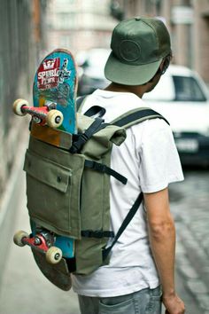 a man with a skateboard strapped to his back