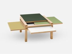 three tables with different shapes and sizes on them