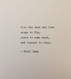 an old typewriter with the words give the ones you love wings to fly, roots to come back and reason to stay