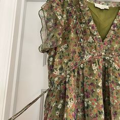 Nwot Olive Green Floral Midi-Length Dress From Pinch. High Waisted With Side Ties To Give Shape. Cap Sleeves And Sheer Overlay. Very Cute And Flowy. Size S. From A Smoke Free Home With Pets Green Floral V-neck Dress With Ruffles, Green Boho Dress With Floral Print And V-neck, Playful Green Floral Print Dress, Green V-neck Paisley Print Dress, 1970s Green Floral Print Dress, Sheer Overlay, Green Floral Dress, Tie Colors, Midi Length Dress