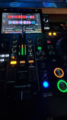 the control panel of a dj's mixing console