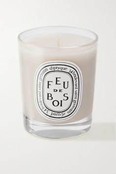 Diptyque's enchanting 'Feu de Bois' candle recalls the familiar scent of a crackling fire. Infused with the essence of rare woods, it creates a wonderfully accurate and enveloping experience. Light yours to cozy up on chilly nights. Boy Smells Candles, Large Scented Candles, Diptyque Candles, Rose Scented Candle, Room Scents, Candle Room, Shop Makeup, Rose Scented Products, Colorful Candles