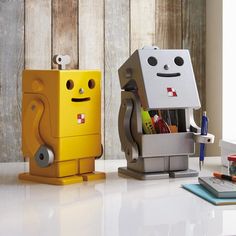 Keep your desk neat and lively with our Wooden Robot Desk Organizer. Designed to look like a colorful robot, this pen holder is perfect for storing your writing tools and other small office supplies. Made from durable wood and painted in bright, eye-catching colors, it’s both a practical and decorative addition to your workspace. Perfect for children’s study desks, home offices, or as a thoughtful gift, this robot pen holder adds a fun and functional element to any room. Material:woodenSize:17.5cm(L)*16cm(W)*19cm(H) (1 inch=2.54cm) Wooden Robot, House Styling, Mini Storage, Stationery Storage, 3d Laser, Small Wood Projects, Toy Organization, Desk Organizer, Wood Toys