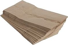 a stack of brown paper towels sitting on top of each other