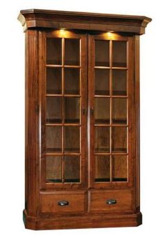 a wooden bookcase with glass doors and drawers