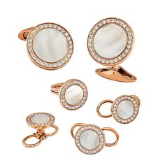 Genuine White mother of pearl gemstones are set by hand onto classic round 18 Karat rose gold. Sparkling diamonds add unexpected flash while perfectly complementing the natural gemstones. 18 karat Rose gold 1.2mm diamonds inlaid & White Mother of Pearl Cufflink & Tuxedo Studs Cufflink(16mm width) Studs(10mm width) whale backs for cufflinks, flip back for studs Packaged in black lacquered wood display box & a velour gifting travel pouch perfect for home display Also available as cufflinks only Rose Gold Tuxedo, Gold Tuxedo, Rose Gold Cufflinks, Tuxedo Studs, Pearl Cufflinks, K Rose, Gold Cufflinks, Lacquered Wood, Cufflink Set