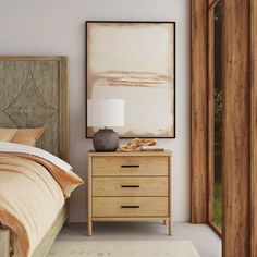 a bedroom scene with focus on the bed, dresser and painting hanging over the headboard