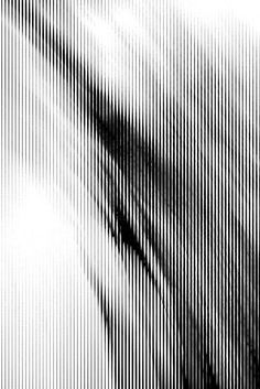 an abstract black and white photo with lines