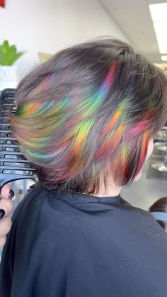 Briauna Conino on Instagram: "Some fun peekaboos for my amazing client. Thank you for making the trip to come see me 🥰 . . . #mermaidhair #pulpriot #pulpriothair #framar #unicornhair #rainbowhair #follow #lasvegassalon #lasvegas #behindthechair #lookbook #lasvegashairstylist #lasvegashair #hendersonhairstylist #nevadahairstylist #lasvegasstylist #hairporn #mermaidians #hairslayerz #peekaboo #prism #highlights" Ribbon Hair Color, Short Hair Pop Of Color, Prism Highlights Black Hair, Iridescent Black Hair, Rainbow Highlights Short Hair, Prism Highlights Hair, Prism Highlights Brown Hair, Prism Hair Color Short, Short Hair Rainbow Color