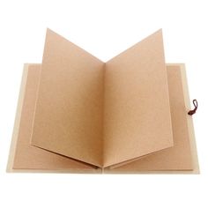 an open book on a white background with clippings to the bottom and inside