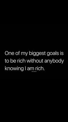 a black and white photo with the words, one of my biggest goals is to be rich