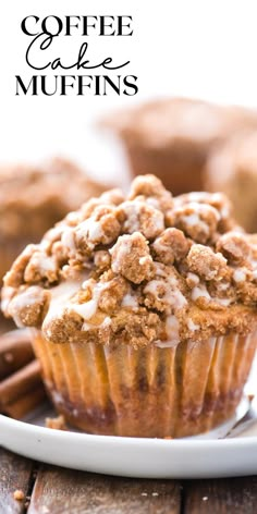 coffee cake muffins on a plate with cinnamon sticks